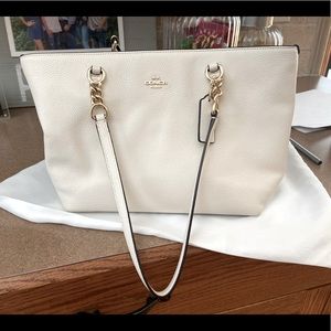 Brand new/never used, white coach purse.